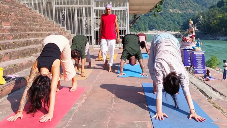 yoga practice during 200 hour YTT course certification near ganga river in rishikesh India