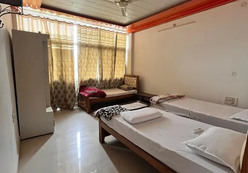 triple sharing room accommodation at Rishikesh Yoga Valley School