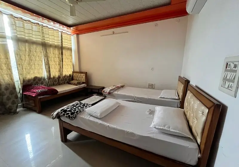 triple sharing room at Rishikesh Yoga Valley School