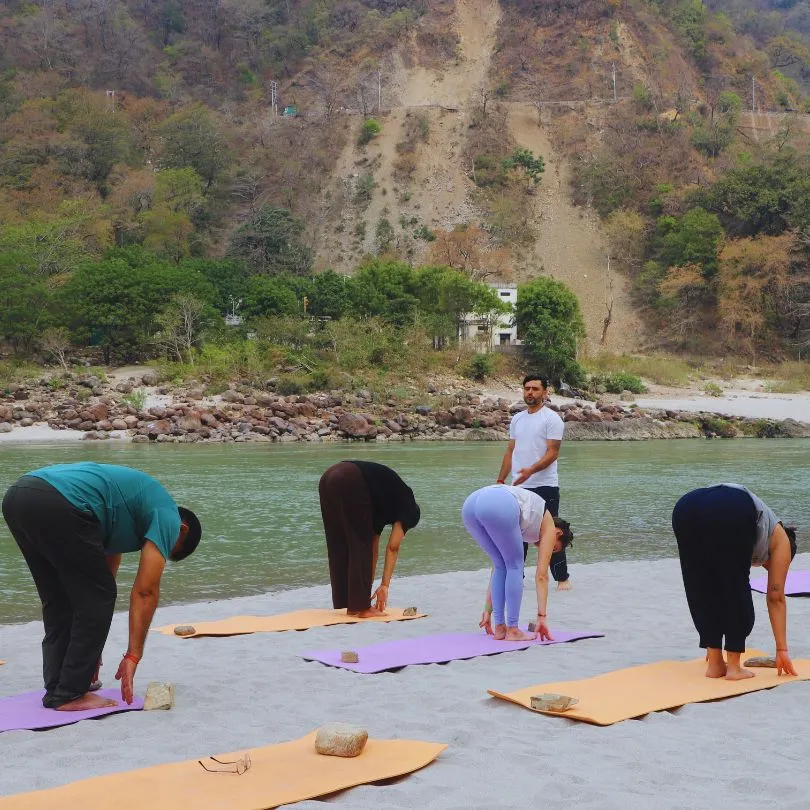 Near Ganga River yoga session during 5 day yoga retreat in rishikesh