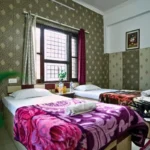 Comfortable twin-sharing accommodation for students attending 50 hour yoga teacher training in Rishikesh, India.