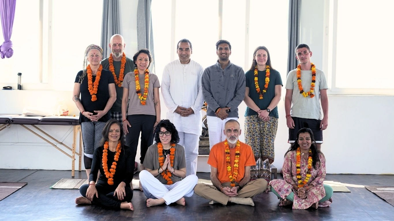 International students and teachers during a yoga training course in Rishikesh India.