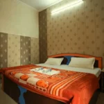 Private accommodation room with double bed for 50 Hour Yoga Teacher Training in Rishikesh India yoga school