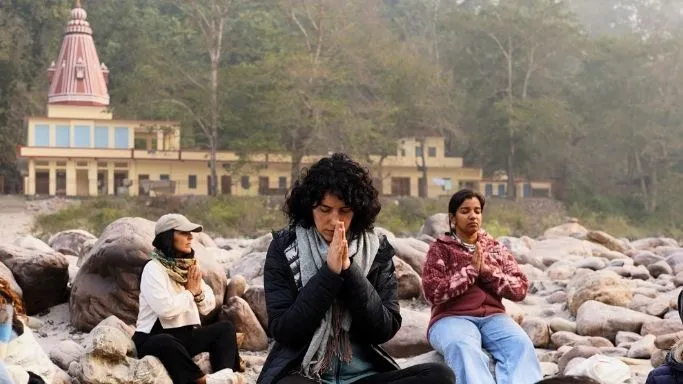 Participant meditating near temple during 5 Days Meditation Retreat in Rishikesh