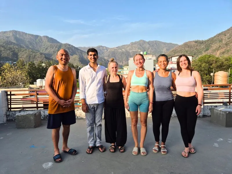 Yoga retreat participants enjoying Himalayan views during 14 days yoga retreat in Rishikesh India with peaceful group atmosphere