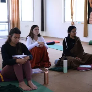 yogi rakesh teaching ayurveda in 500 hour yoga teacher training course in rishikesh