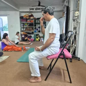 Upendra Silswal teaching Pranayama to students during a 10 Days Yoga Retreat in Rishikesh
