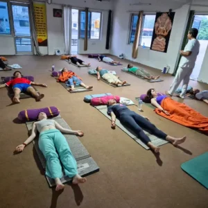 Upendra Silswal guiding students through a Pranayama and relaxation session during a 10 Days Yoga Retreat in Rishikesh