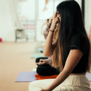 Students doing alomvilom in morning during their 200 hour yoga teacher training in Rishikesh