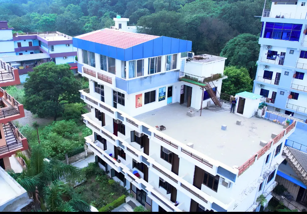 Yoga retreat center surrounded by lush green forest for a 6 Days Nature and Yoga Retreat in Rishikesh