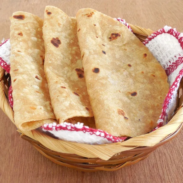 Freshly prepared Indian flatbread served as part of a 6 Days Nature and Yoga Retreat in Rishikesh