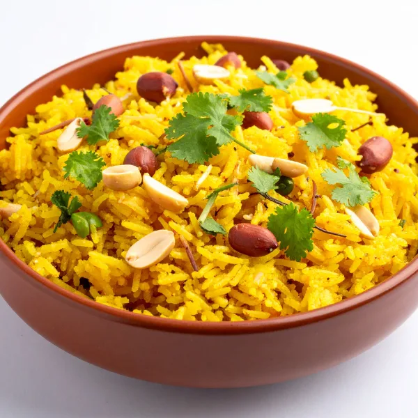 Freshly prepared rice meal served during a 6 Days Nature and Yoga Retreat in Rishikesh