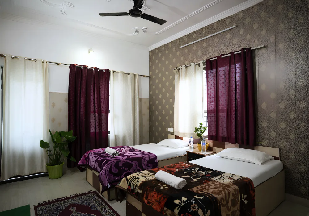 Comfortable twin room accommodation for guests on a 6 Days Nature and Yoga Retreat in Rishikesh