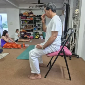 Upendra Silswal teaching Pranayama to students during a 7 Days Yoga Retreat in Rishikesh