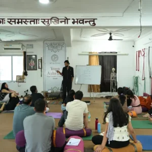 Jagjeet Singh explaining Yoga Philosophy to students during a 7 Days Yoga Retreat in Rishikesh