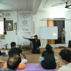 Jagjeet Singh explaining Yoga Philosophy to students during a 7 Days Yoga Retreat in Rishikesh