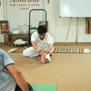 Neeraj Rayal demonstrating an Ashtanga Yoga leg stretch during a 7 Days Yoga Retreat in Rishikesh