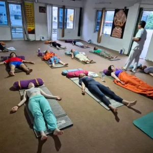 Upendra Silswal guiding students through a Pranayama relaxation session during a 7 Days Yoga Retreat in Rishikesh