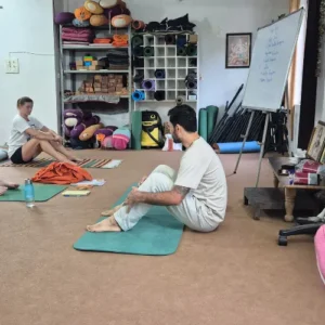 Rohit Kamboj teaching Hatha Yoga to students during a 7 Days Yoga Retreat in Rishikesh