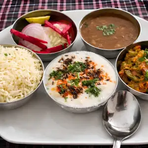 Fresh satvik Indian meal served during a sound healing course in Rishikesh