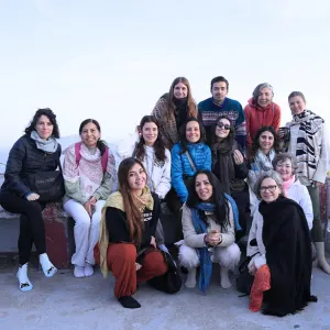 Group portrait of international students posing outdoors during a sound healing course in Rishikesh