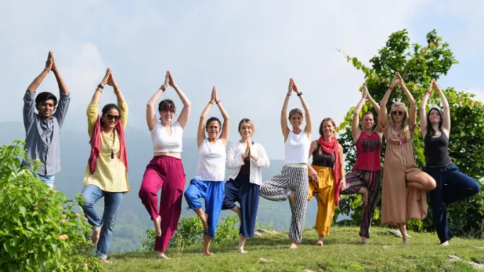 Participants practicing yoga together during a 10 Days Yoga Retreat in Rishikesh