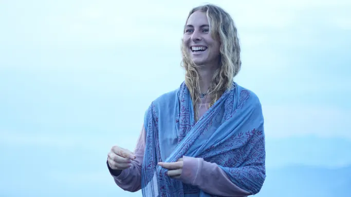 Yoga retreat participant enjoying a peaceful moment during a 7 Days Yoga Retreat in Rishikesh